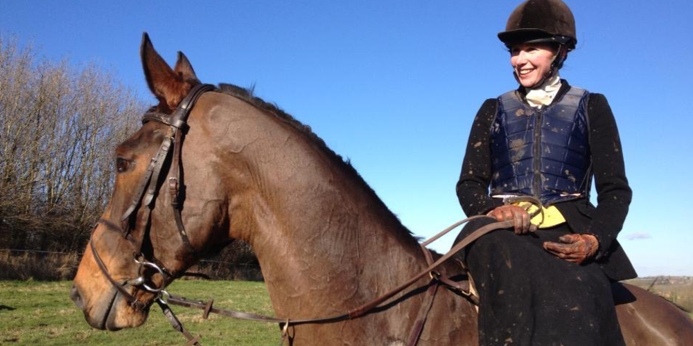 Riding side saddle